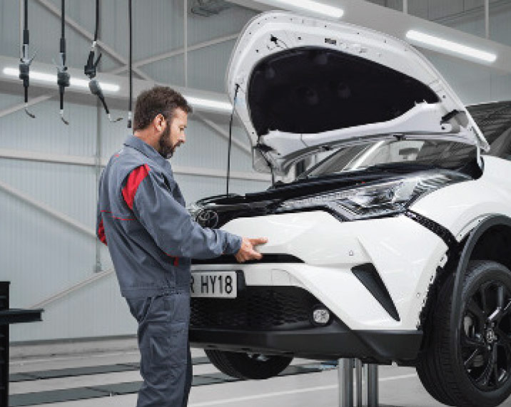 Toyota motor mechanic at work